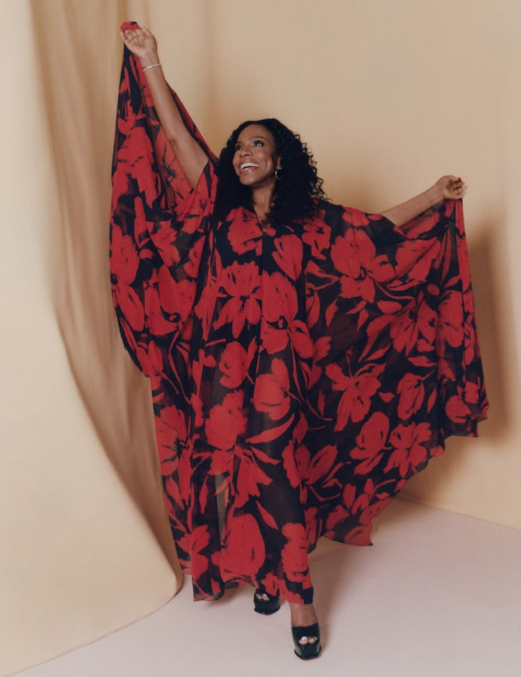 Ralph wears a Michael Kors dress; Jemma Wynne earrings; Pomellato bracelet; Christian Louboutin shoe...