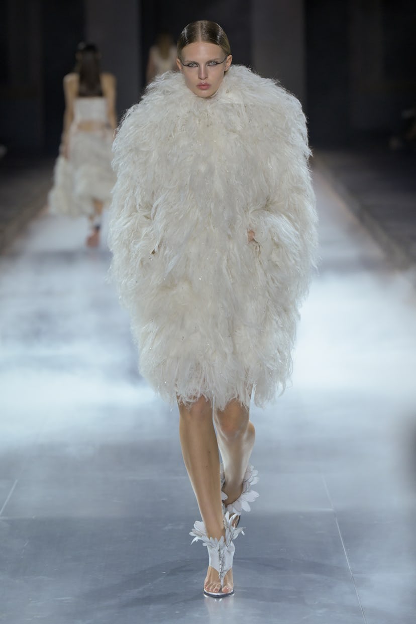 Model on the runway at Alexander McQueen RTW Spring 2025 as part of Paris Ready to Wear Fashion Week...
