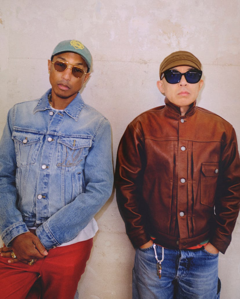 Pharrell and Nigo wearing hats and sunglasses