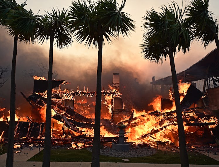 TOPSHOT - A home burns during the Palisades Fire in Pacific Palisades, California, on January 8, 202...