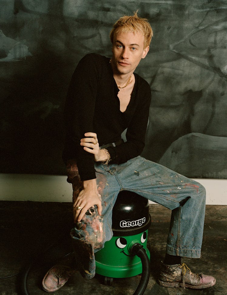 Rouy in his own clothing and accessories.