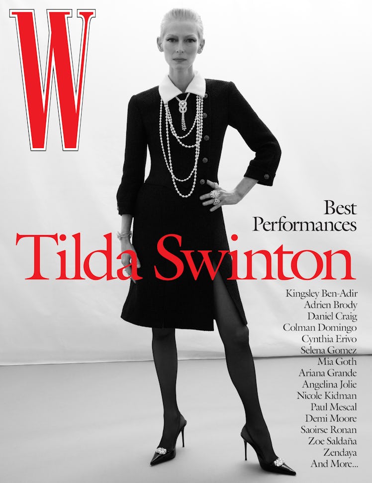 Swinton wears a Chanel dress; Chanel High Jewelry necklaces, bracelet, and rings; Wolford tights; Gi...