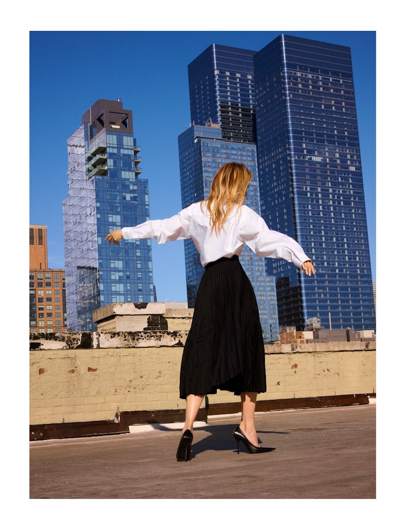 Nicole Kidman dancing on a rooftop
